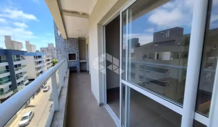 APARTAMENTO NO BAIRRO BOMBAS, EM BOMBINHAS, SC, SACADA COM CHURRASQUEIRA, 03 DORMITÓRIOS SENDO 02 SUÍTES, E 01 VAGA DE GARAGEM.