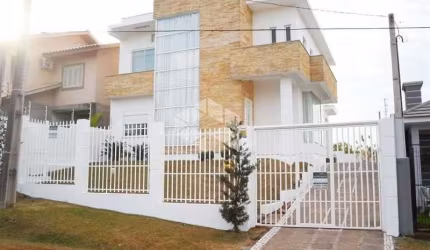 Venda de Casa de 3 Dormitórios com Suíte em Lajeado no Universitário