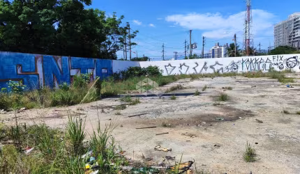 Terreno com 1.570,79m2, plano, cercado, viabilidade AMS, ao lado da Marginal da BR 101