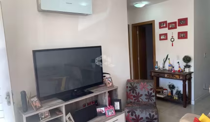Casa térrea com 2 dormitórios, 2 vagas de garagem, em Condominio, bairro Olaria em Canoas