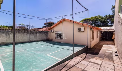 Crédito Real vende CASA comercial / residência com 3 quartos (suíte) vaga para 5 carros no bairro Passo da Areia - RS.