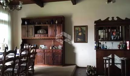 Crédito Real vende CASA de 4 quartos (2 suítes) e 3 vagas de garagem no centro de Viamão - RS.