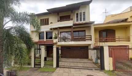 Casa à venda com 4 suítes,  4 vagas de garagem,  no bairro Jardim Planalto - Porto Alegre/RS