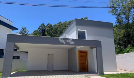 Casa com condomínio fechado com 3 suítes A Venda - Cacheira do Bom Jesus Florianópolis Sc