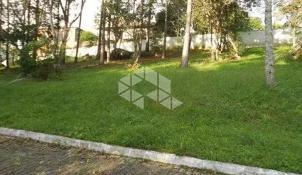 Terreno em condomínio fechado no bairro Ratones, com 450,95m².