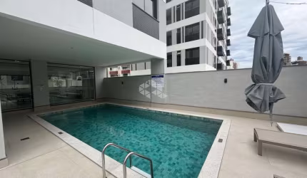 APARTAMENTO MODERNO COM 2 QUARTOS, SENDO 2 SUÍTES, 1 VAGA DE GARAGEM NO BAIRRO BALNEÁRIO EM FLORIANÓPOLIS/SC.