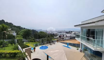 CASA EM CONDOMINIO DE LUXO COM 4 QUARTOS SENDO 2 SUÍTES 2 VAGAS DE GARAGEM NO BOSQUE DAS MANSÕES EM SÃO JOSÉ/SC