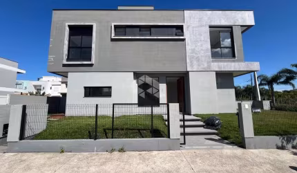 CASA COM 3 QUARTOS SENDO 1 SUÍTE E 2 VAGAS DE GARAGEM NO RIBEIRÃO DA ILHA EM FLORIANÓPOLIS/SC