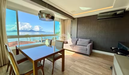 APARTAMENTO COM 2 SUÍTES 2 VAGAS DE GARAGEM E VISTA PANORÂMICA EM COQUEIROS FLORIANÓPOLIS/SC - PORTEIRA FECHADA, 100% MOBILIADO.