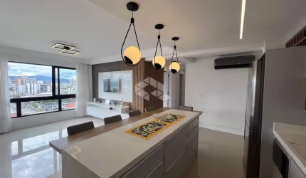 APARTAMENTO SEMIMOBILIADO COM VISTA PARA O MAR COM 3 QUARTOS SENDO 1 SUÍTE E 2 VAGAS DE GARAGEM NO BALNEÁRIO EM FLORIANÓPOLIS/SC