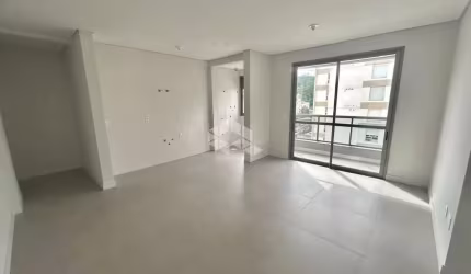 APARTAMENTO MODERNO DE 3 QUARTOS SENDO 1 SUÍTE COM 1 VAGA DE GARAGEM E VISTA PANORÂMICA NA CARVOEIRA FLORIANÓPOLIS