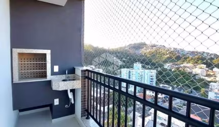 APARTAMENTO 2 QUARTOS SENDO 1 SUÍTE COM SACADA GOURMET NO CARVOEIRA