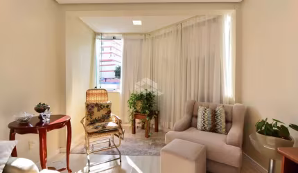 APARTAMENTO SEMIMOBILIADO COM 3 QUARTOS SENDO 1 SUÍTE E 1 VAGA DE GARAGEM EM COQUEIROS FLORIANÓPOLIS
