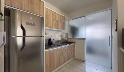 APARTAMENTO SEMIMOBILIADO COM 2 QUARTOS E SACADA COM CHURRASQUEIRA EM SÃO JOSÉ