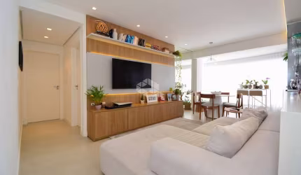 APARTAMENTO SEMIMOBILIADO COM 2 SUÍTES 1 VAGA DE GARAGEM E VISTA PARCIAL DO MAR EM COQUEIROS FLORIANÓPOLIS