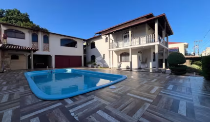 CASA COM 3 QUARTOS SENDO 1 SUÍTE 2 VAGAS DE GARAGEM  E ÁREA GOURMET COMPLETA  NA PRAIA COMPRIDA EM SÃO JOSÉ