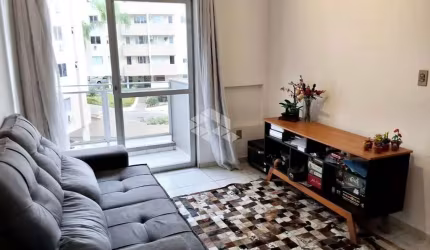 APARTAMENTO 2 QUARTOS SEMIMOBILIADO AO LADO DA UFSC COM 1 VAGA DE GARAGEM E SACADA