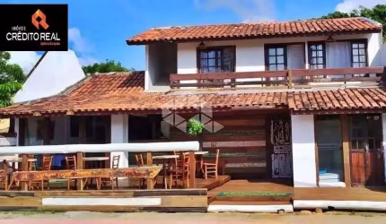 Pousada na Avenida Principal da Praia da Ferrugem