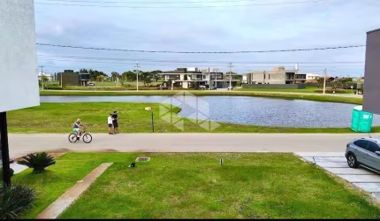 Lote frente lago no Condomínio Sunset em Xangri-lá