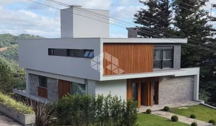 Casa 4 suítes, 491m² privativos, no Condomínio Aspen Mountain, em Gramado