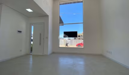Casa com 3 dormitórios, sendo uma suíte, sala estar em condomínio fechado