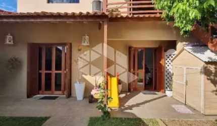 Casa 03 dormitórios, para vender no bairro Passos dos Ferreiros em Gravataí