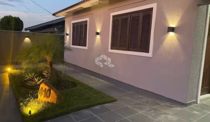 Terreno com duas casas no Parque dos Anjos