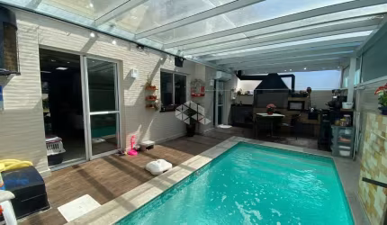 Casa em Condomínio com 04 dormitórios de Alto Padrão Em Canoas.