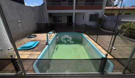 Casa à venda com 3 quartos e 2 vagas no centro de Guaíba