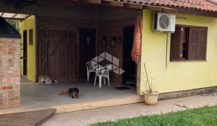 Casa à venda com 4 quartos e 3 vagas no bairro Residencial de Eldorado do Sul