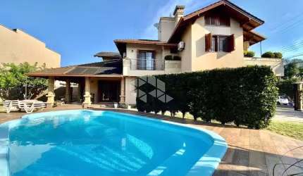 Sobrado 4 dormitórios , pátio com piscina no Bairro Bela Vista - Canoas /RS