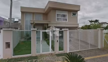 Sobrado de 4 dormitórios no Bairro Marechal Rondon.