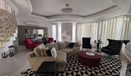 Casa de 359m², com 3 quartos/suítes, 5 banheiros e 4 vagas no bairro Marechal Rondon..