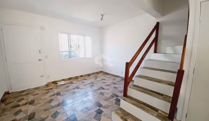 Sobrado em Condomínio com 3 dormitórios no Bairro Rio Branco/Canoas-RS.