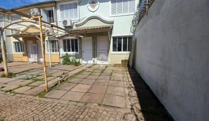 Casa em Condomínio com 2 dormitórios, aceita financiamento no Bairro Rio Branco/Canoas -RS.