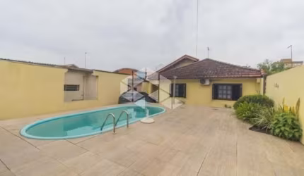 Casa térrea, com 3 Quartos, sendo 1 suíte, com piscina, Bairro Scharlau, São Leopoldo/RS