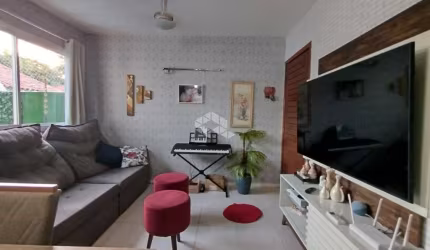 Casa térrea com 54,97m²  em condomínio fechado localizada no bairro Olaria em Canoas.