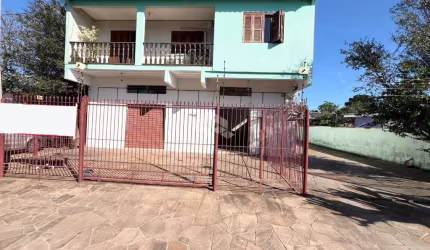 SOBRADO COM 3 DORMITÓRIOS E SALA COMERCIAL