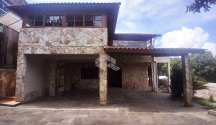 Casa/sobrado à venda, 510m², 5 dormitórios sendo 3 suítes, 5 vagas, bairro Vila Nova, Porto Alegre/RS