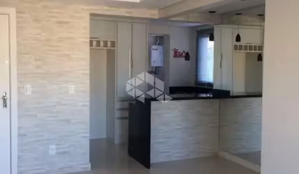 Apartamento semi mobiliado à venda, 2 dormitórios, suíte, churrasqueira, andar alto.