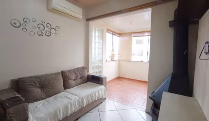 APARTAMENTO DE 1 DORMITORIO COM SACADA, CHURRASQUEIRA E VAGA