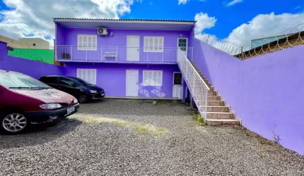 Prédio Residencial com 4 apartamentos amplos, no bairro Sarandi, em Porto Alegre.