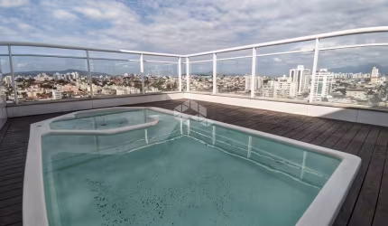 COBERTURA COM PISCINA EM CONDOMINIO FECHADO DE 3 DORMITÓRIOS NO BAIRRO BARREIROS - SÃO JOSÉ/SC