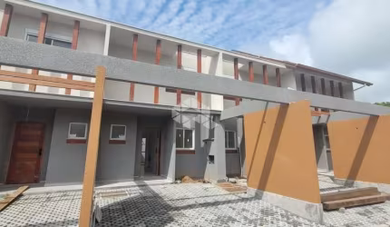CASA EM CONDOMÍNIO DE DOIS QUARTOS NO MORRO DAS PEDRAS EM FLORIANÓPOLIS/SC