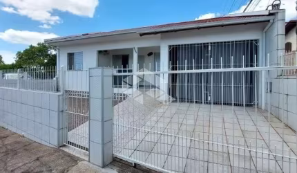 CASA COM DOIS DORMITÓRIOS NO CENTRO - PALHOÇA/SC