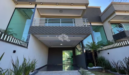 Linda casa em Porto Belo com 3 suítes e piscina