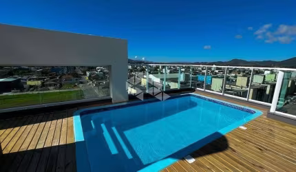 Apartamento 2 dormitórios, 1 vaga, sacada com churrasqueira.
