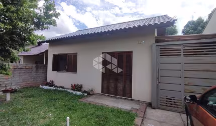 Casa Charmosa com Quiosque e Energia Solar: Seu Novo Lar Aguarda por Você!