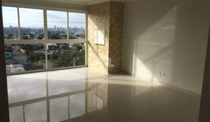 Apartamento 2 dormitórios, 67,30m2, com vaga de estacionamento coberta, living 2 ambientes com churrasqueira e vista panorâmica