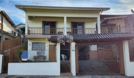 Casa a venda no bairro Primavera em Novo Hamburgo/RS, 3 dormitórios sendo 1 suíte, Aceita financiamento bancário.